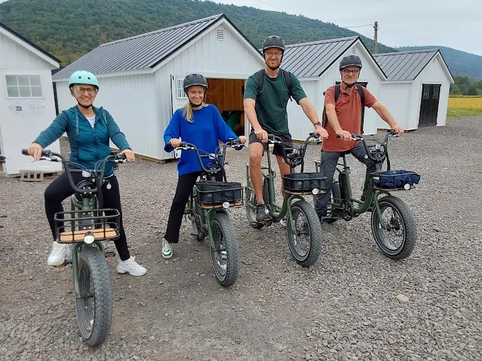 First-time riders enjoying an easy e-bike ride on the Pine Creek Rail Trail
